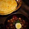 Chole With Tawa Bhatura, part of the Indian street food tasting menu at Tajnuma, Agra