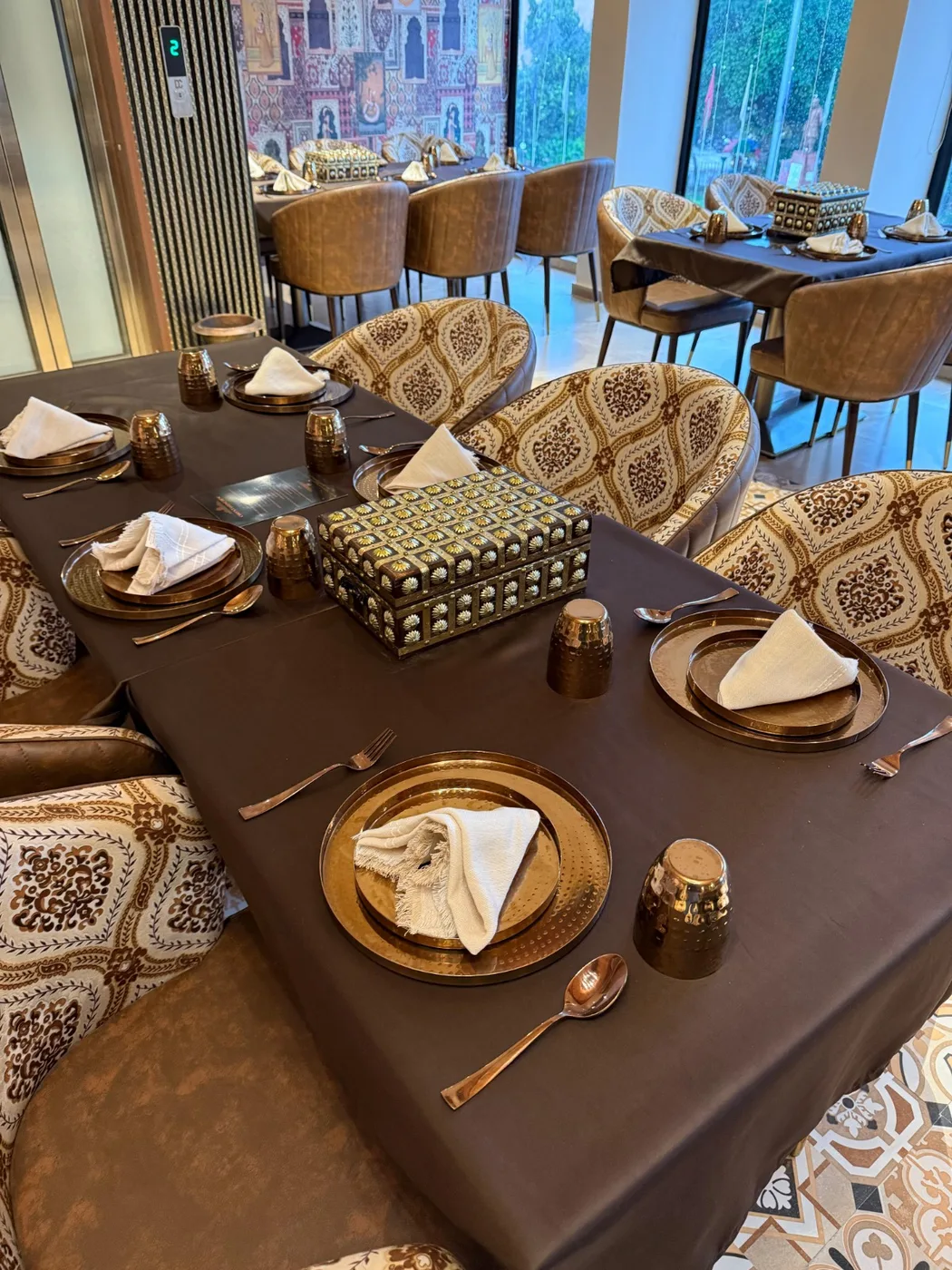 A table laid for a meal in the dining room at Tajnuma, Agra
