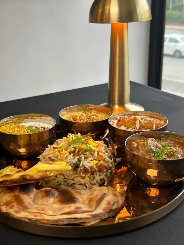 A platter of kebabs and tikkas, fresh from the tandoor. Tajnuma, Agra.